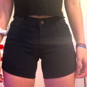 Black low-rise Hollister shorts, jegging material